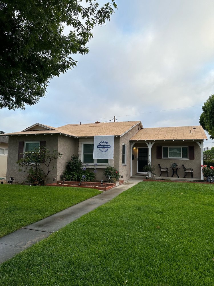 Slide of Stay Dry Roofing Company