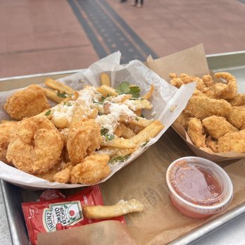 Big Ray's Fish Camp - Shrimp Basket with Garlic Parmesan Fries and Fried Grouper Nuggets with Sweet Chili Sauce - Seafood Near Me - Tampa, Florida Big Ray's Fish Camp - Shrimp Basket with Garlic Parmesan Fries and Fried Grouper Nuggets with Sweet Chili Sauce - Seafood Near Me - Tampa, Florida