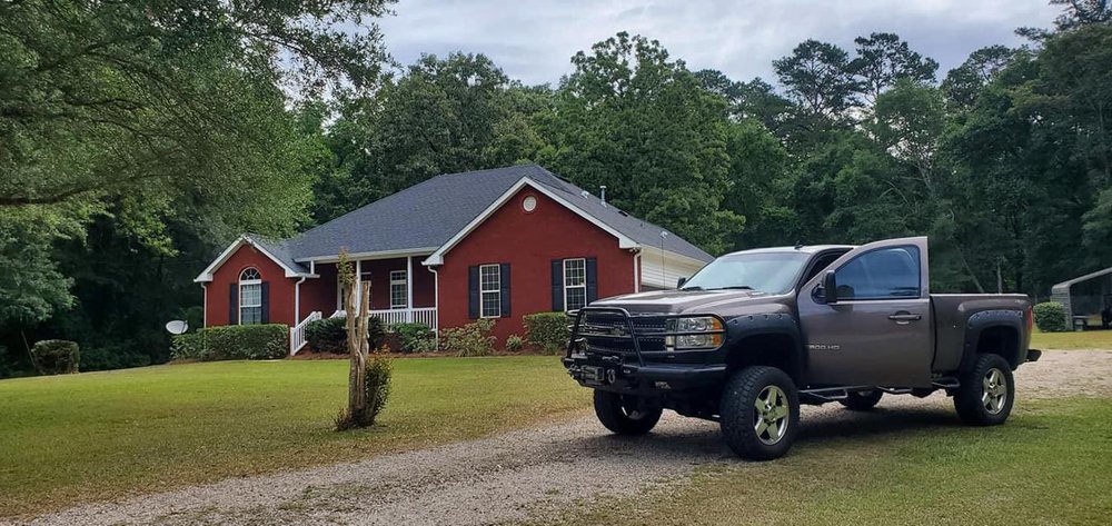 Slide of SE Roofing and Construction