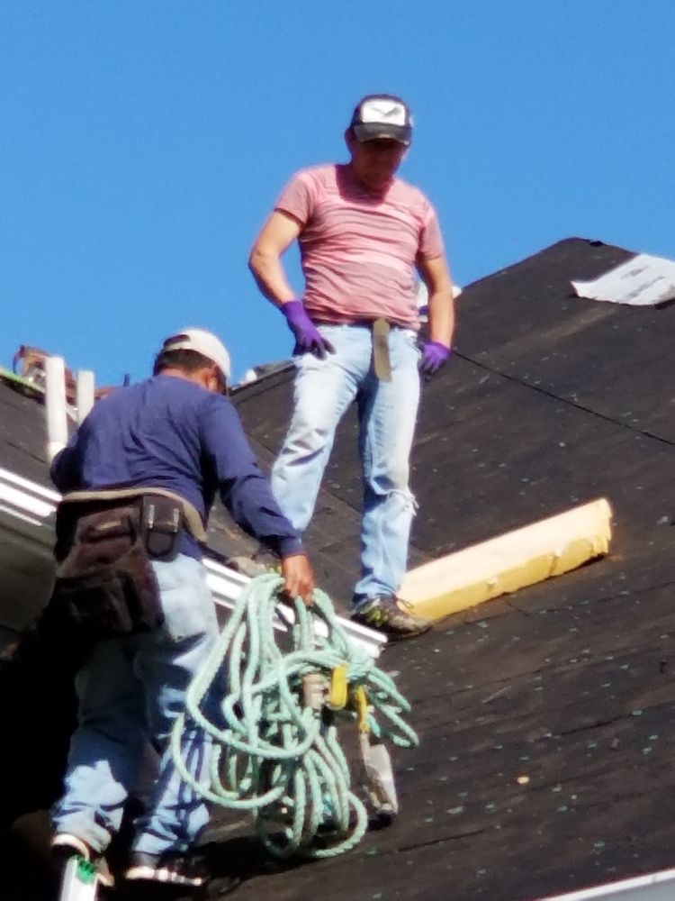 Slide of FAM Roofing