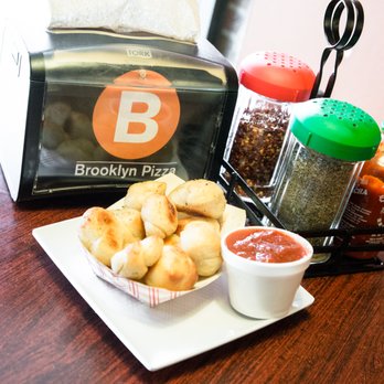 Brooklyn Pizza - a plate of doughnuts and dipping sauce - Pizza Near Me - Denver, Colorado Brooklyn Pizza - a plate of doughnuts and dipping sauce - Pizza Near Me - Denver, Colorado