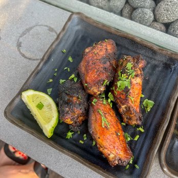 Zanzibar - Jerk Chicken Wings - Tiki Bars Near Me - Austin, Texas Zanzibar - Jerk Chicken Wings - Tiki Bars Near Me - Austin, Texas