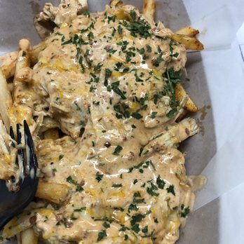 Sub Fusion - a plate of french fries and a fork - Food Trucks Near Me Sub Fusion - a plate of french fries and a fork - Food Trucks Near Me