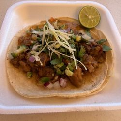Chicharron taco with toppings