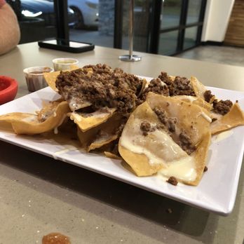 Fogata Street Tacos - Beef and cheese nachos. - Mexican Near Me - Warner Robins, Georgia Fogata Street Tacos - Beef and cheese nachos. - Mexican Near Me - Warner Robins, Georgia