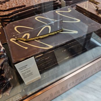 Läderach - Dubai Dark Chocolate with Pistachio Cream inside - Chocolatiers & Shops Near Me - New York, New York Läderach - Dubai Dark Chocolate with Pistachio Cream inside - Chocolatiers & Shops Near Me - New York, New York