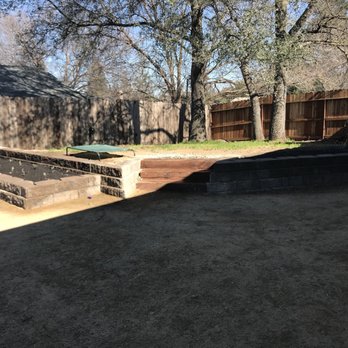 New Vision Landscape - a back yard with a retaining wall - Landscaping Near Me New Vision Landscape - a back yard with a retaining wall - Landscaping Near Me