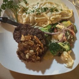 Perfectly cooked filet, veggies and Alfredo. Salad dressings were super taste also! Perfectly cooked filet, veggies and Alfredo. Salad dressings were super taste also!