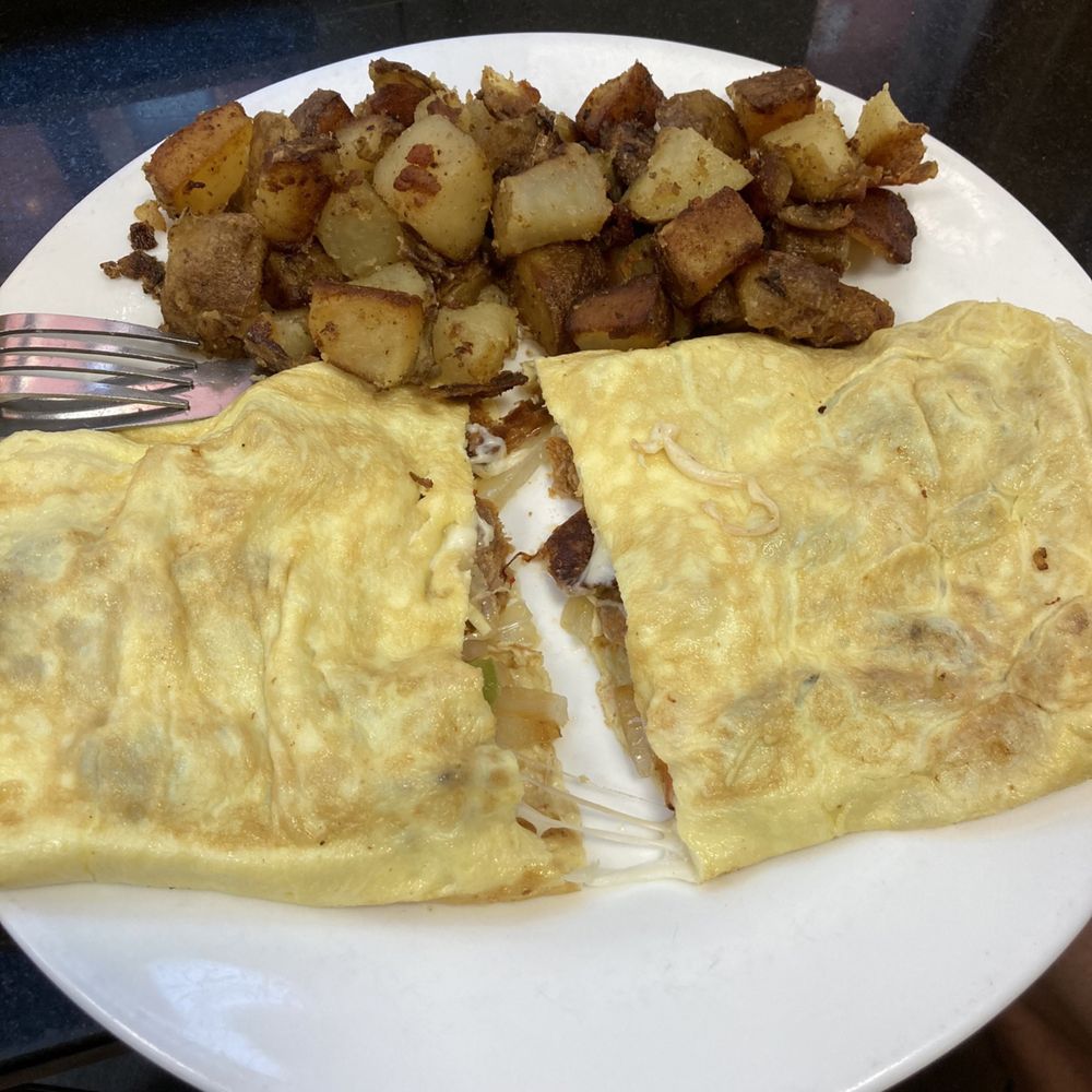 Theo's Cozy Corner - Hot Italian Sausage and Provolone Cheese Omelet - Breakfast & Brunch Near Me - Boston, Massachusetts Theo's Cozy Corner - Hot Italian Sausage and Provolone Cheese Omelet - Breakfast & Brunch Near Me - Boston, Massachusetts