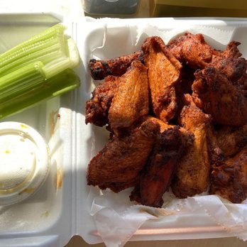 Points East Pub - 18 Hot Wings with blue cheese and celery - Sports Bars Near Me - Milwaukee, Wisconsin Points East Pub - 18 Hot Wings with blue cheese and celery - Sports Bars Near Me - Milwaukee, Wisconsin