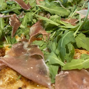 Taglia - Prosciutto arugula fig pizza - Italian Near Me - Pearland, Texas Taglia - Prosciutto arugula fig pizza - Italian Near Me - Pearland, Texas