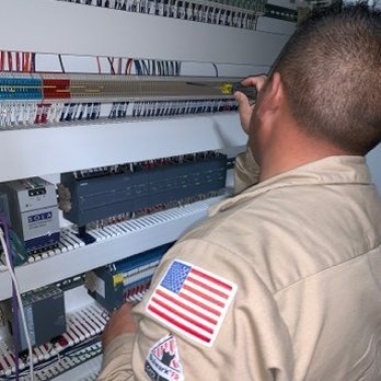 Integrity Automation and Electrical - Terminating wires in the PLC cabinet for temperatures sensors at a  local brewery. - Electricians Near Me