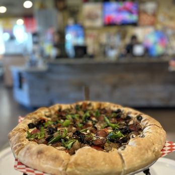 Round Table Pizza - a pizza on a plate - Pizza Near Me - Tustin, California Round Table Pizza - a pizza on a plate - Pizza Near Me - Tustin, California