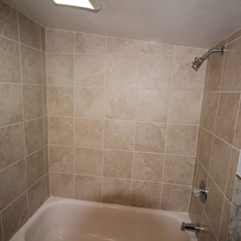 Virtue Construction & Design - a bathtub in a bathroom - General Contractors Near Me Virtue Construction & Design - a bathtub in a bathroom - General Contractors Near Me