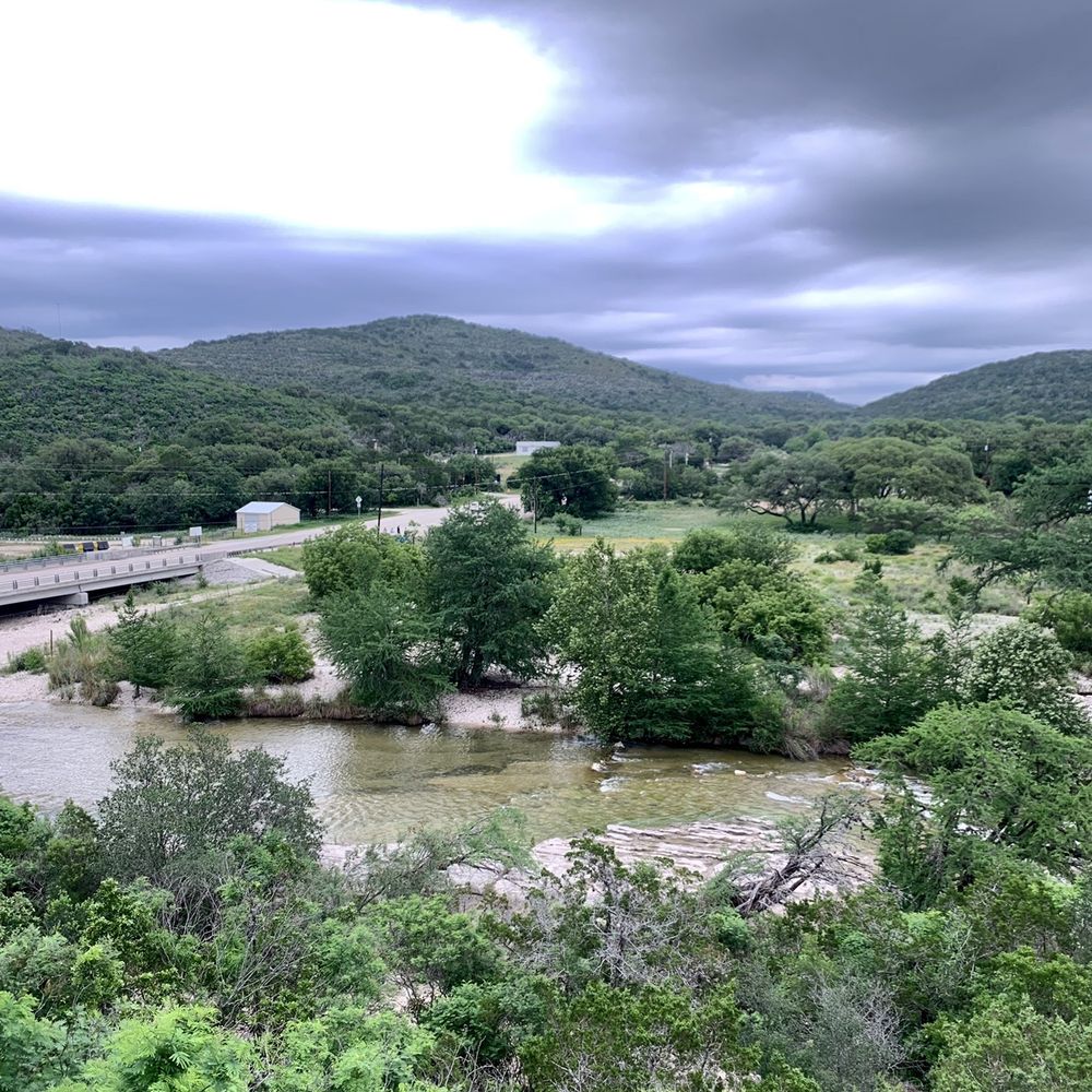 Neal's Dining Room - Porch overlooking the frio - American Near Me - Concan, Texas
