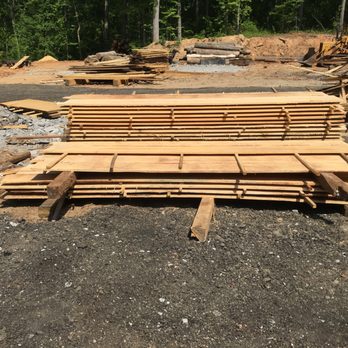 Brocks Sawmill - Fresh pine boards off the sawmill. They are being dry-stacked to air dry. - Building Supplies Near Me Brocks Sawmill - Fresh pine boards off the sawmill. They are being dry-stacked to air dry. - Building Supplies Near Me