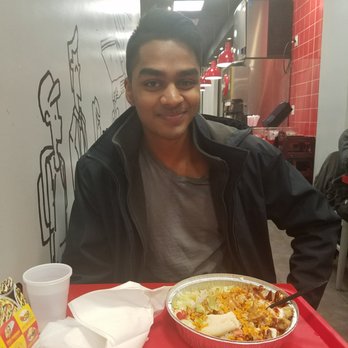 The Halal Guys - Friend happy (pre-eating too much of the hot sauce and dying of the heat) - Halal Near Me - Fairfax, Virginia The Halal Guys - Friend happy (pre-eating too much of the hot sauce and dying of the heat) - Halal Near Me - Fairfax, Virginia