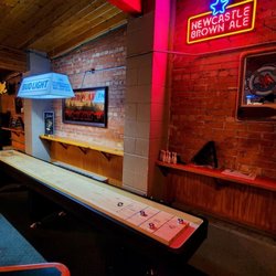 Kate's - New shuffle board table in back