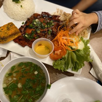 Teabreak Pho & Boba Herndon - grilled pork with rice, meatloaf, fried shredded pork, and side of broth/soup (accompanied by toddler fingers) - Vietnamese Near Me - Herndon, Virginia Teabreak Pho & Boba Herndon - grilled pork with rice, meatloaf, fried shredded pork, and side of broth/soup (accompanied by toddler fingers) - Vietnamese Near Me - Herndon, Virginia