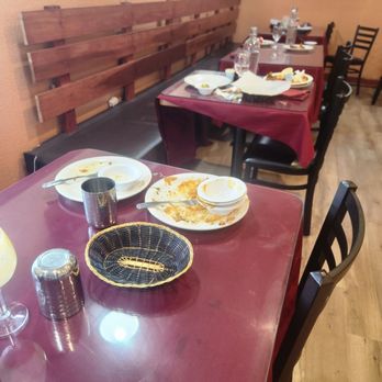Masala House - Four tables in a row uncleared... some of of those parties departed 10-15 minutes earlier. - Indian Near Me - Concord, California