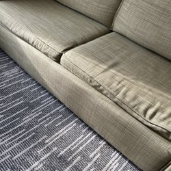 Country Inn & Suites by Radisson, Holland, MI - Worn collapsed sofa