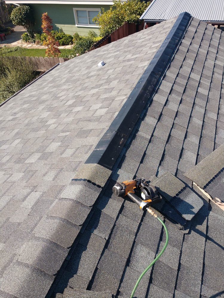 Slide of Henry Roofing