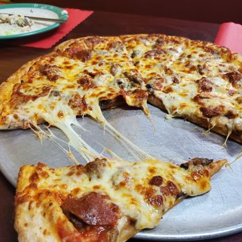 Spinners Pizza & Pasta - Delicious Meat Lovers with extra cheese - Pizza Near Me - Hilliard, Florida Spinners Pizza & Pasta - Delicious Meat Lovers with extra cheese - Pizza Near Me - Hilliard, Florida