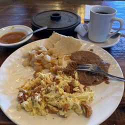 El Jardin Mexican Restaurant - Chicharrón w/egg refried beans frijoles and potato.  Homemade salsa (nice little kick to it) and handmade corn tortillas.