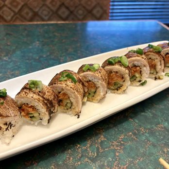 Rolls & Rolls Plus Sushi - Yellowtail seared with spicy tuna inside - Sushi Bars Near Me - Bellevue, Washington Rolls & Rolls Plus Sushi - Yellowtail seared with spicy tuna inside - Sushi Bars Near Me - Bellevue, Washington