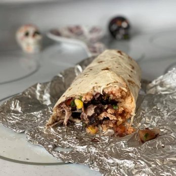 Laughing Planet - Bubba Burrito with black beans. - Vegetarian Near Me - Reno, Nevada Laughing Planet - Bubba Burrito with black beans. - Vegetarian Near Me - Reno, Nevada