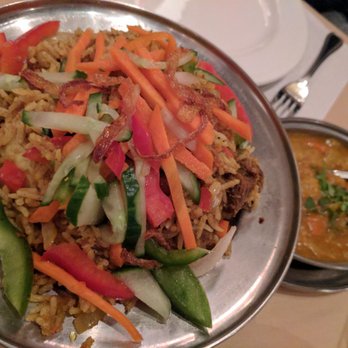 Mysore Fine Cuisine Indienne - a plate of food on a table - Indian Near Me - Montreal, Quebec Mysore Fine Cuisine Indienne - a plate of food on a table - Indian Near Me - Montreal, Quebec