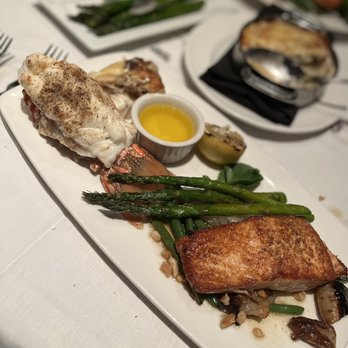 The Capital Grille - Seared Citrus Glazed Salmon and lobster tail - Steakhouses Near Me - Phoenix, Arizona The Capital Grille - Seared Citrus Glazed Salmon and lobster tail - Steakhouses Near Me - Phoenix, Arizona