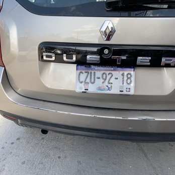 Budget Car Rental - Budget piece of junk car.  They called this an extra fee upgrade from an intermediate. - Car Rental Near Me - Cancún, ROO