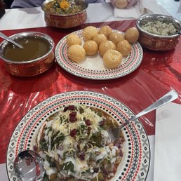 From bottom, left, right, top: Samosa Chaat, Pani puri, Goat Thukpa From bottom, left, right, top: Samosa Chaat, Pani puri, Goat Thukpa