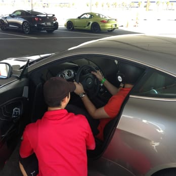 Exotics Racing - Getting a little 'PEP' talk from the instructors, about to wheel out the Aston Martin Vantage S - Racing Experience Near Me - LAS VEGAS NV, Nevada