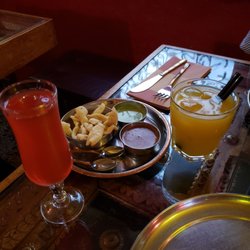 New Punjab - A couple signature drinks, a vodka drink and a mango drink.