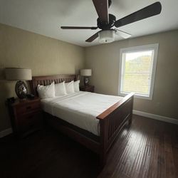 Chief Logan Lodge and Conference Center - One of the bedrooms (they all looked the same and were the same size; 1 queen size bed in each)