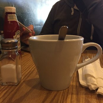 Brewed Awakening - The size of my coffee...it's huge! it looks like it would almost be a pint. Salt shaker to compare size. - Coffee & Tea Near Me - Metuchen, New Jersey Brewed Awakening - The size of my coffee...it's huge! it looks like it would almost be a pint. Salt shaker to compare size. - Coffee & Tea Near Me - Metuchen, New Jersey