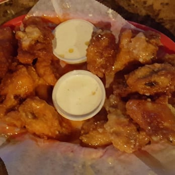 Fast Eddie's Billiards Austin-Northfork - 20 piece bone in wings. Right: Hot. Left: Garlic. Both were juicy, cripsy, amazing - Pool Halls Near Me - Austin, Texas