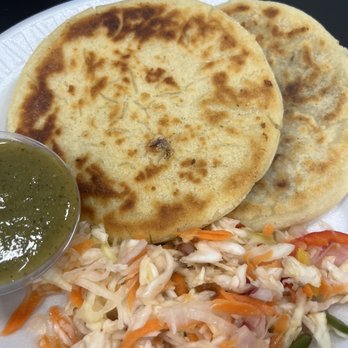 Chevron - two flatbreads and a salad on a plate - Gas Stations Near Me - Fort Worth, Texas