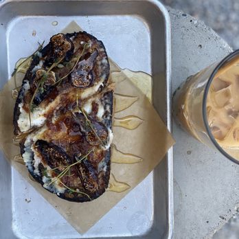 Harless + Hugh - Fig toast with sliced figs, ricotta, fig jam, honey, thyme, and rustic bread. - Coffee & Tea Near Me - Bay City, Michigan