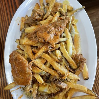 Sanguche - Peru poutine adobo de cerdo - Peruvian Near Me - Naperville, Illinois Sanguche - Peru poutine adobo de cerdo - Peruvian Near Me - Naperville, Illinois