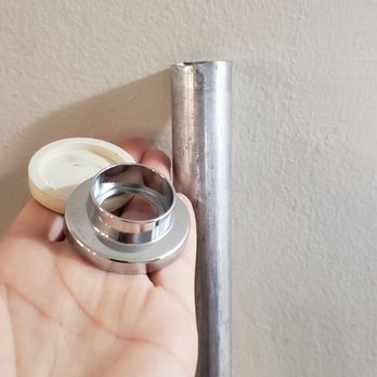 Crossings at One - Faulty curtain rod installed by The Crossings- held together by two loose pieces which eventually collapsed and struck me in the head. - Apartments Near Me - Fords, New Jersey