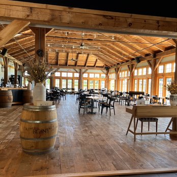 RGNY - the inside of a restaurant with tables and chairs - Wineries Near Me - Riverhead, New York