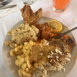The Historic Green Manor - Buffet style food (fish, rice, Mac & cheese, dressing, yams, fried chicken.