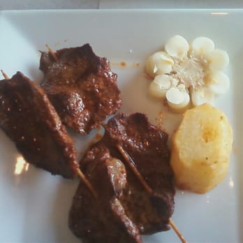 Coracora - anticuchos - Sliced beef heart on a skewer!! With potatoes and corn, of course... - Latin American Near Me - West Hartford, Connecticut Coracora - anticuchos - Sliced beef heart on a skewer!! With potatoes and corn, of course... - Latin American Near Me - West Hartford, Connecticut