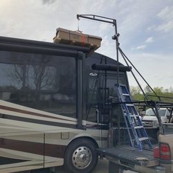 Mobile RV Repair - Installing new air conditioner.