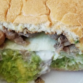 Tacos Gavilan - Lengua torta after a few bites. - Tacos Near Me - Azusa, California Tacos Gavilan - Lengua torta after a few bites. - Tacos Near Me - Azusa, California