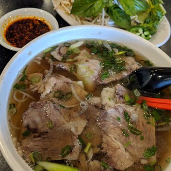 Kien Giang - Pho chin (well done steak) with a side of chili oil, for flavor. - Vietnamese Near Me - D'Iberville, Mississippi