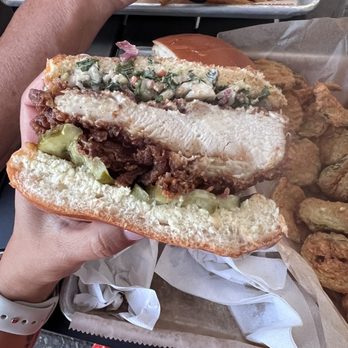 Ocmulgee Brewpub - Chicken sandwich cut in half. Where is the hot ghost pepper sauce? - New American Near Me - Macon, Georgia